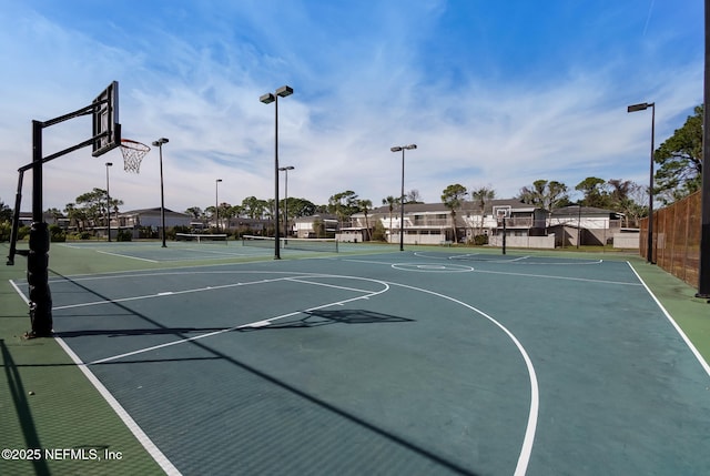 view of sport court with community basketball court and fence