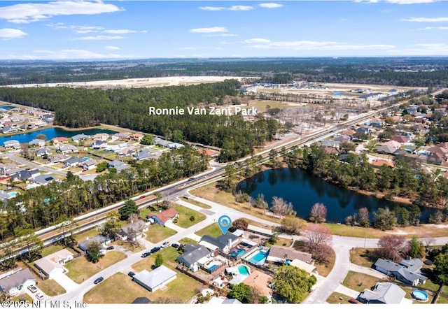 drone / aerial view featuring a water view