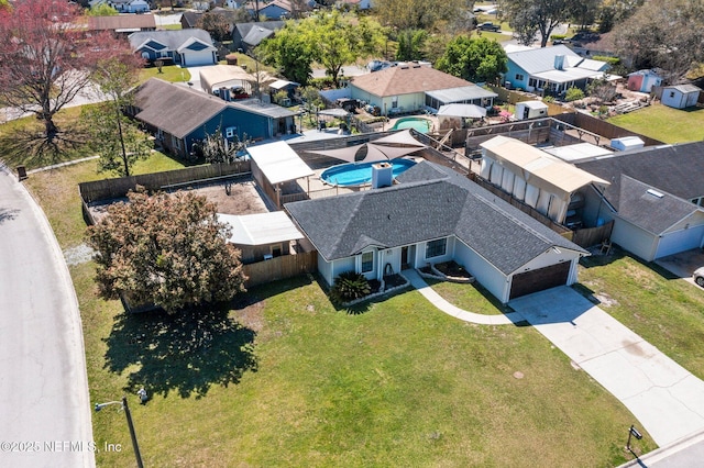 drone / aerial view with a residential view