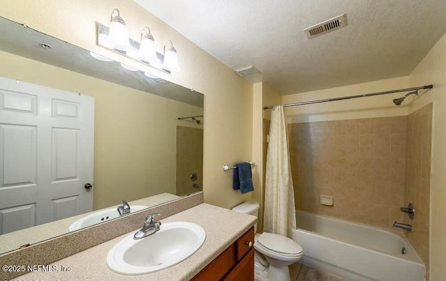 full bathroom with visible vents, toilet, a textured ceiling, shower / tub combo, and vanity