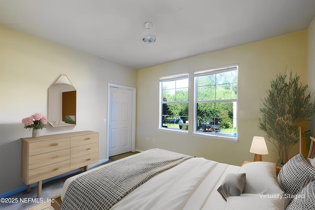 bedroom with baseboards