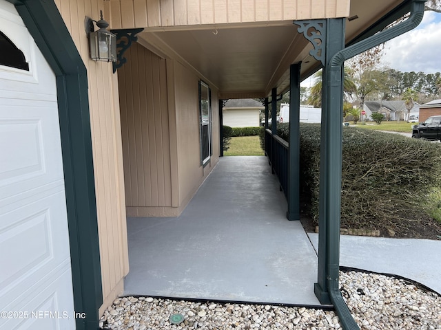 view of patio featuring a garage