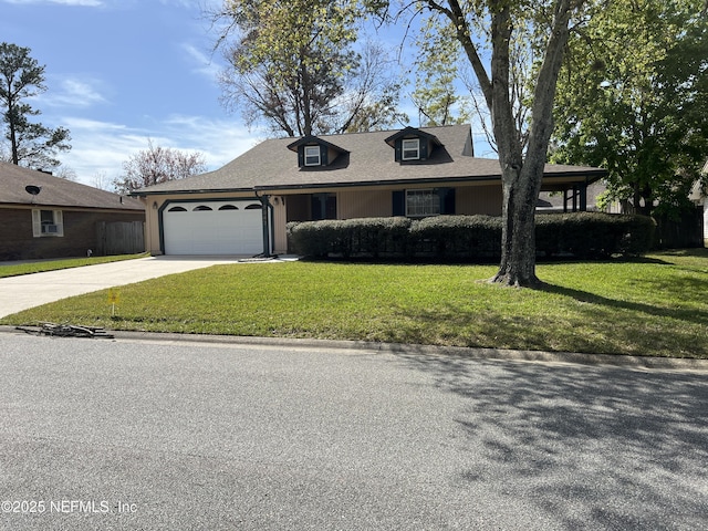 view of front of house with a front lawn, a garage, driveway, and roof with shingles