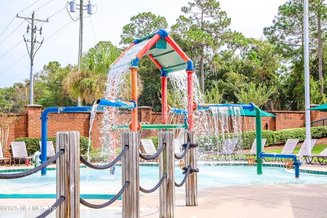 view of playground with fence