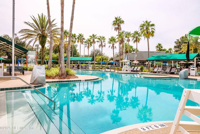 community pool with a patio