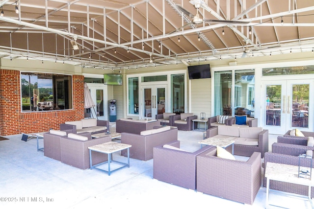 view of patio with french doors and an outdoor hangout area