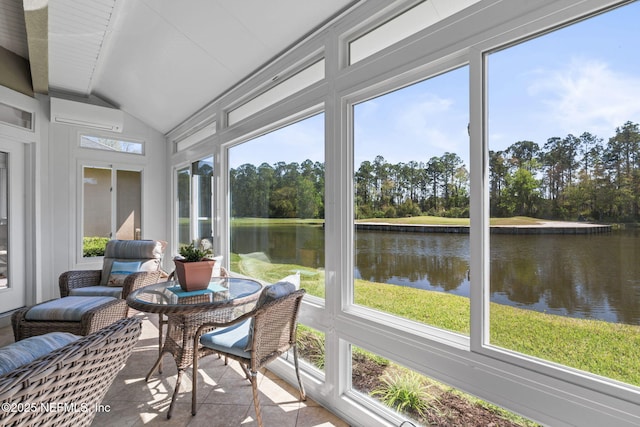 sunroom / solarium with vaulted ceiling, a water view, and a wall mounted AC