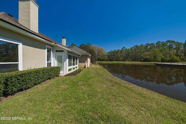 view of yard featuring a water view