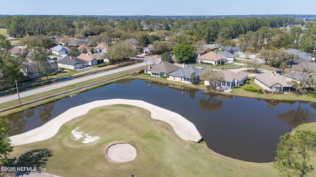 bird's eye view featuring a residential view and a water view