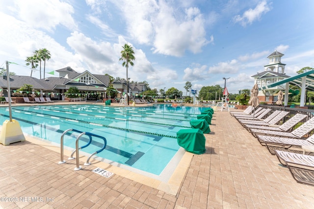 community pool with a patio