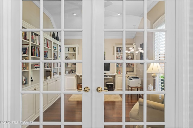 room details featuring french doors and a chandelier