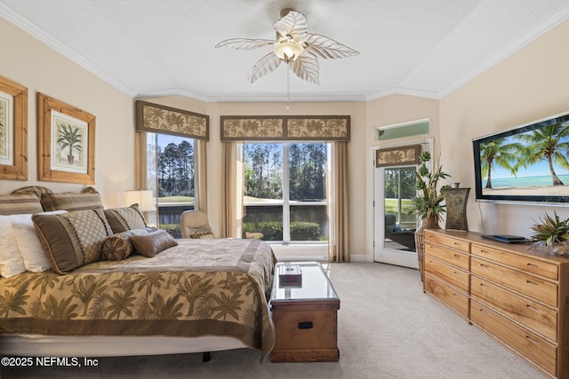 bedroom with lofted ceiling, access to outside, light colored carpet, and ornamental molding