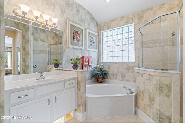 bathroom with a shower stall, baseboards, a garden tub, tile patterned floors, and vanity