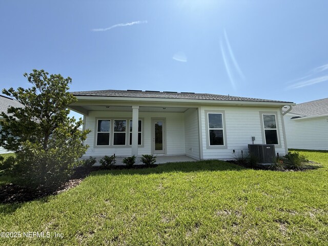 286 Lamego Ln, Saint Augustine, FL 32095 - back of house featuring a lawn