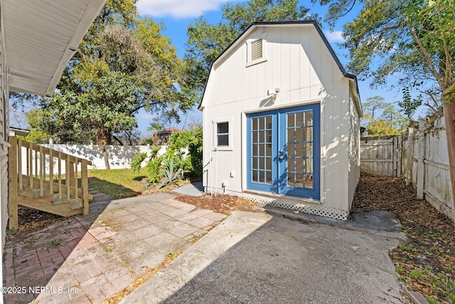 view of outbuilding with an outdoor structure and a fenced backyard