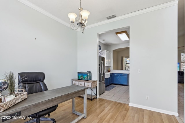 home office with visible vents, an inviting chandelier, light wood-style flooring, and crown molding