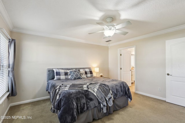 carpeted bedroom featuring crown molding, baseboards, visible vents, and ceiling fan