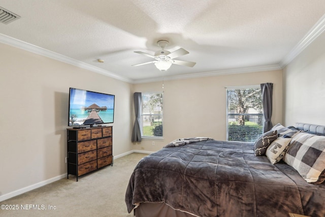 bedroom featuring crown molding, multiple windows, visible vents, and light carpet