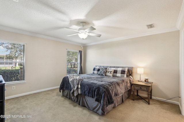 bedroom featuring light carpet, visible vents, baseboards, and ornamental molding