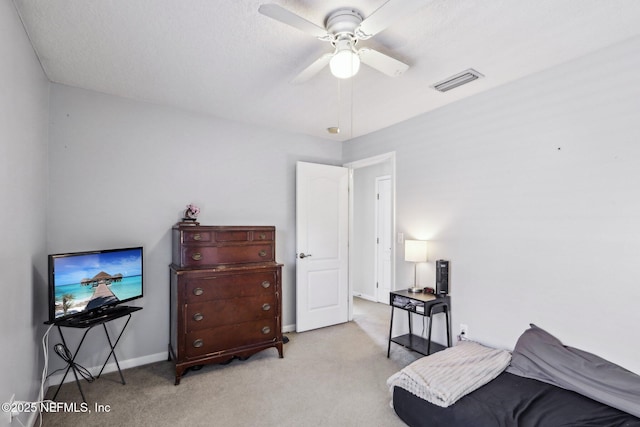 bedroom with visible vents, ceiling fan, baseboards, and carpet