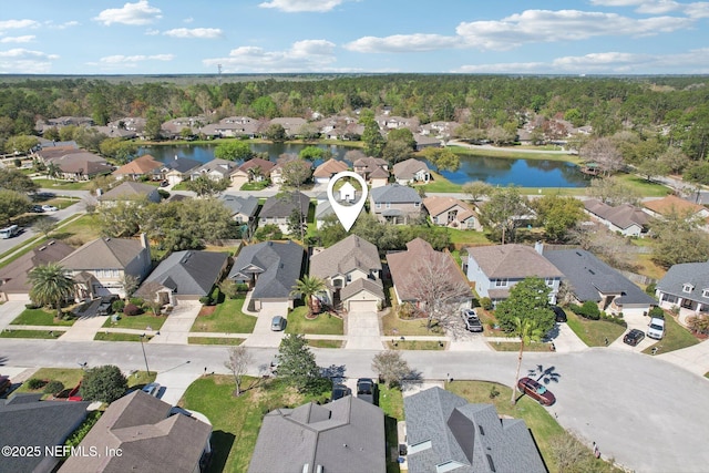 aerial view featuring a residential view and a water view