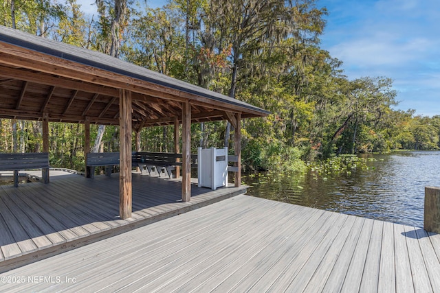 view of dock with a water view