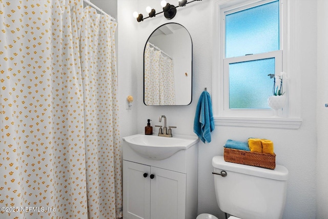 322 N 5th St, Flagler Beach, FL 32136 - bathroom featuring vanity, toilet, and a shower with curtain