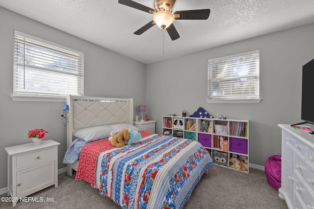1516 Prospect St, Palatka, FL 32177 - carpeted bedroom with a textured ceiling, baseboards, and a ceiling fan
