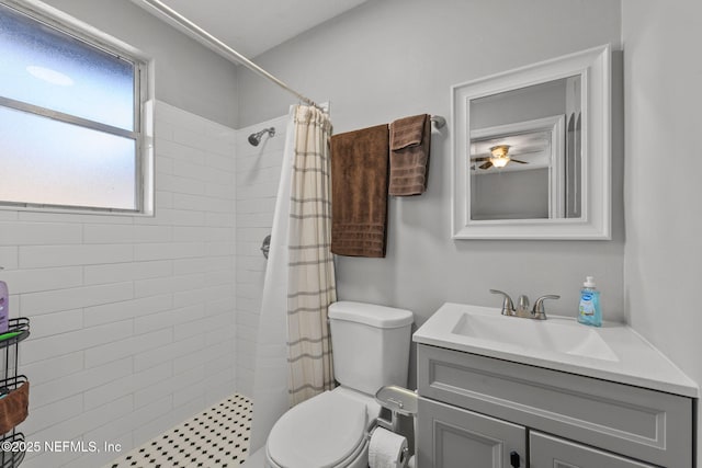 1516 Prospect St, Palatka, FL 32177 - full bathroom with vanity, toilet, and a tile shower