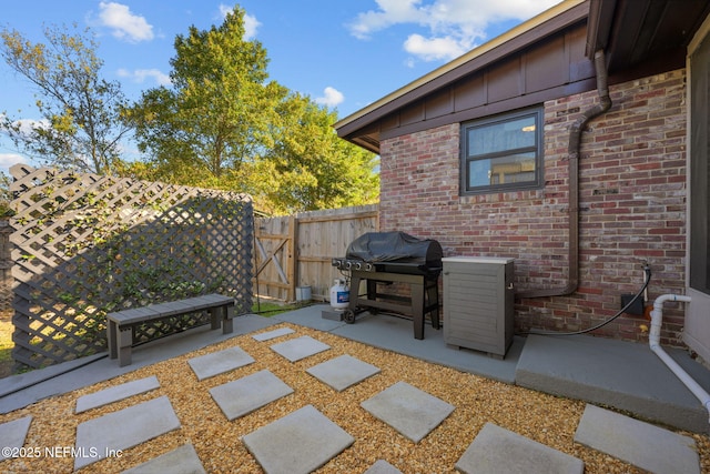 1516 Prospect St, Palatka, FL 32177 - view of patio with area for grilling, a gate, and fence