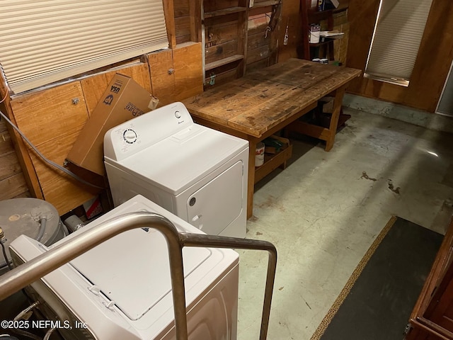 clothes washing area featuring laundry area and washer and dryer