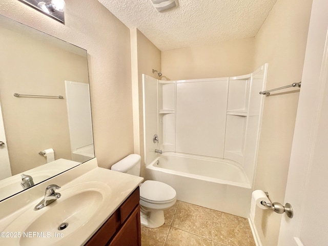 full bathroom featuring vanity, bathtub / shower combination, a textured ceiling, tile patterned floors, and toilet