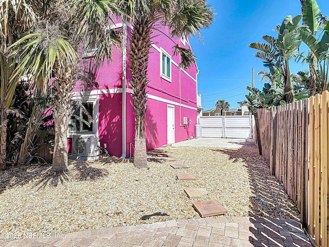 exterior space featuring a gate and fence