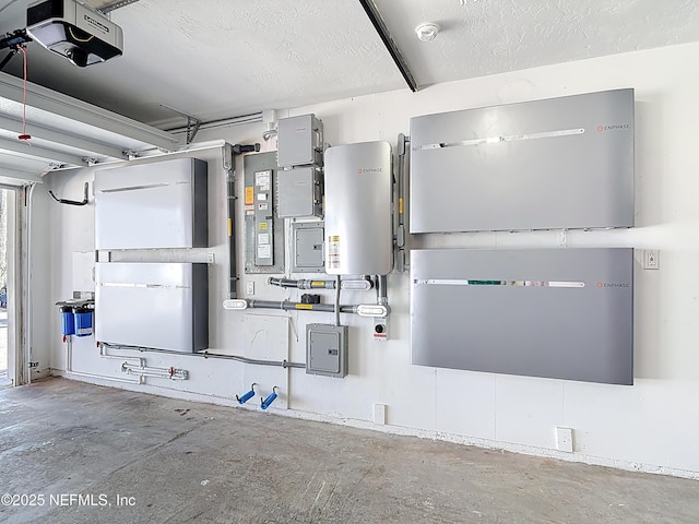 garage featuring a garage door opener and water heater