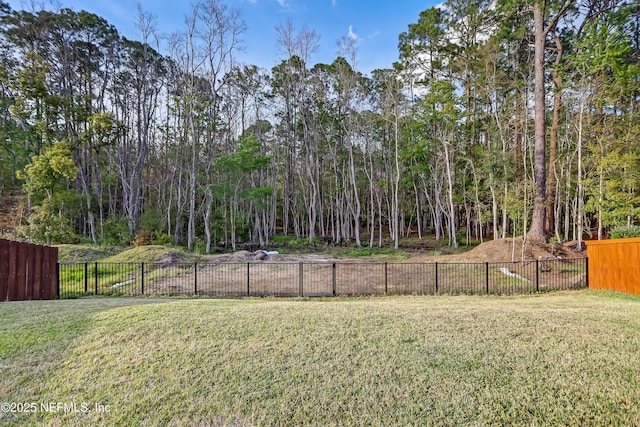 view of yard with fence