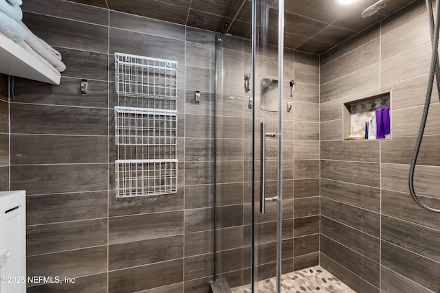 full bathroom featuring a shower stall