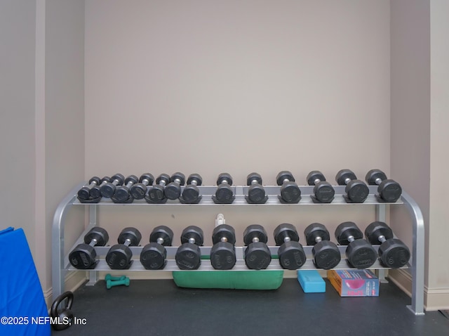 exercise room with baseboards