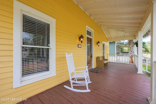 wooden deck with covered porch