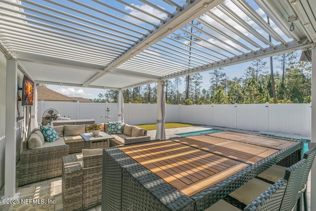 view of patio / terrace featuring an outdoor living space, a fenced backyard, and a pergola