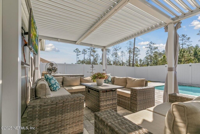 view of patio / terrace with an outdoor living space, a fenced backyard, and a fenced in pool