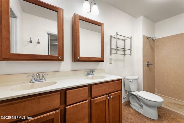 full bath featuring double vanity, toilet, a shower, and a sink