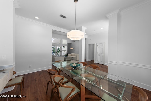 dining area featuring visible vents, baseboards, crown molding, recessed lighting, and wood finished floors