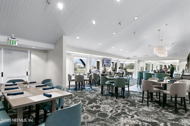 dining room with carpet flooring and recessed lighting