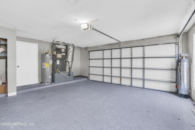 garage with heating unit, a garage door opener, and water heater