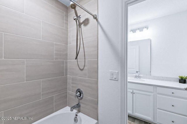 full bathroom featuring vanity and washtub / shower combination