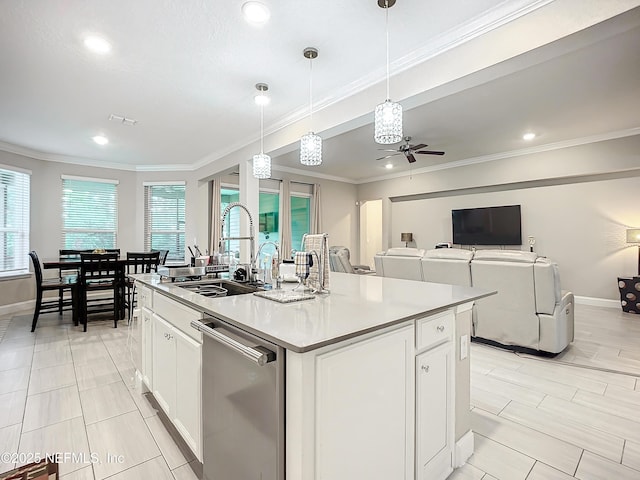 kitchen featuring visible vents, white cabinetry, ornamental molding, a sink, and dishwasher