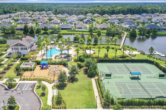 bird's eye view with a residential view and a water view