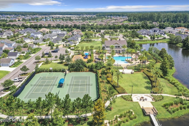 birds eye view of property featuring a residential view and a water view