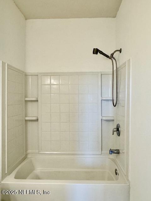 full bathroom with shower / tub combination