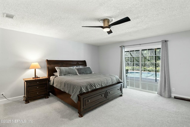 bedroom featuring a ceiling fan, visible vents, baseboards, access to outside, and light colored carpet